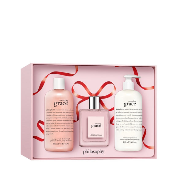Philosophy Amazing Grace gift set with pink lotion, perfume bottle, and white pump bottle in decorative box