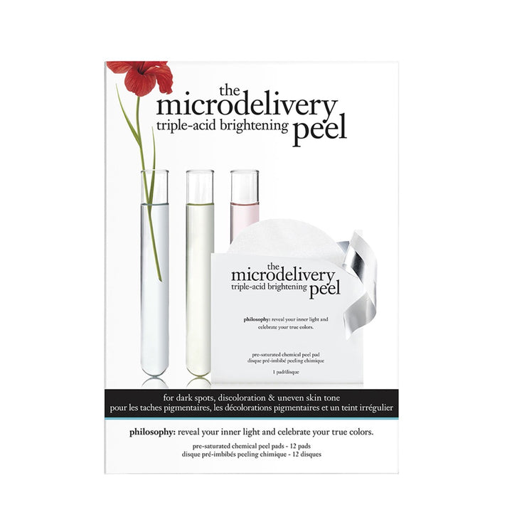 Philosophy microdelivery triple acid peel kit with test tubes and pre-saturated chemical peel pads for brightening skin