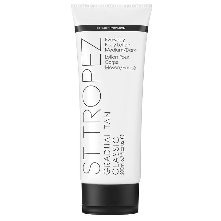 St Tropez Gradual Tan Classic everyday body lotion medium dark self tanner in white tube