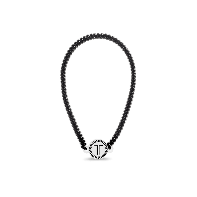 Teleties headband in black with a stylish circular logo for all-day hold and comfort