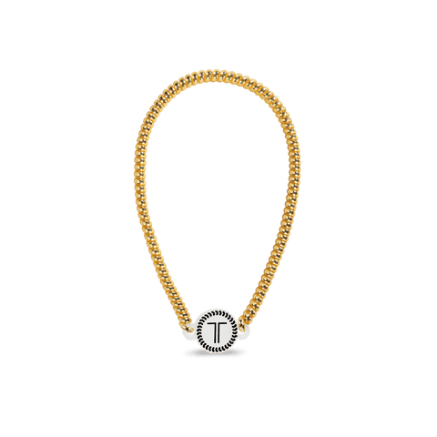 Gold Teleties headband featuring a stylish design for secure and comfortable wear