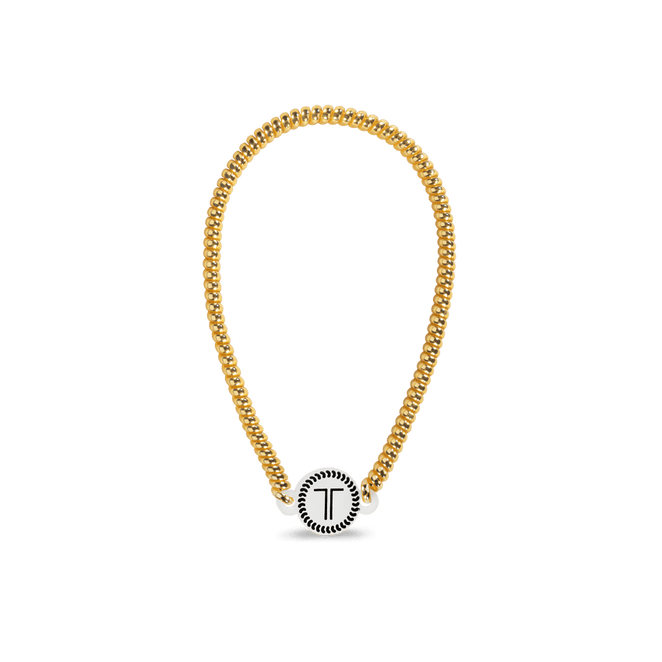 Gold Teleties headband featuring a stylish design for secure and comfortable wear