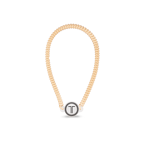 Teleties headband in beige with a stylish T logo for comfortable and secure hair management