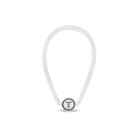 Teleties headband in clear with a decorative logo for stylish hair management