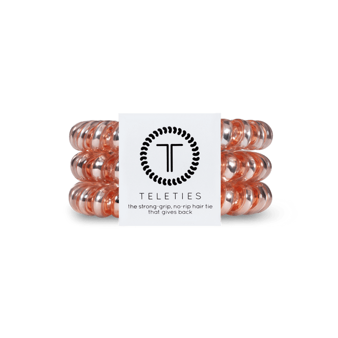 Teleties strong grip hair ties in peach color for a secure and stylish hair hold