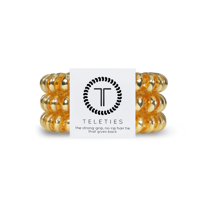 Teleties strong grip hair ties in golden color for a stylish and secure hold without hair damage
