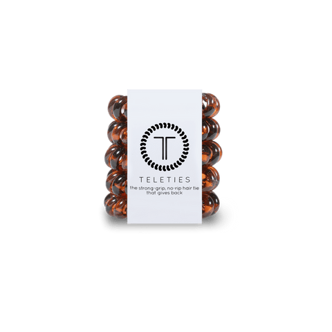 Teleties tiny hair ties in dark orange packaging for strong grip and no damage hair styling
