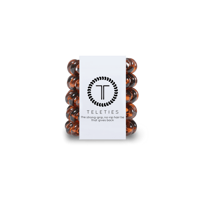 Teleties tiny hair ties in dark orange packaging for strong grip and no damage hair styling