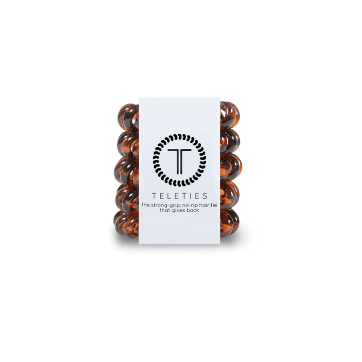 Teleties tiny hair ties in dark orange packaging for strong grip and no damage hair styling