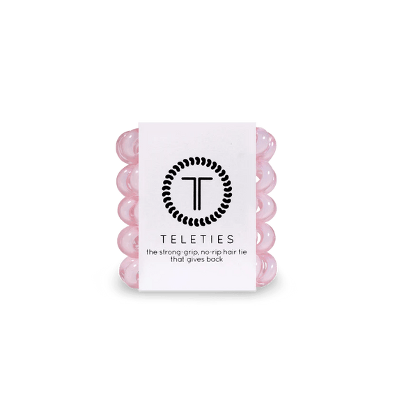 Pack of Teleties tiny hair ties in pink, designed for a strong grip and no rip quality