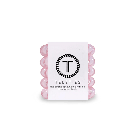 Pack of Teleties tiny hair ties in pink, designed for a strong grip and no rip quality