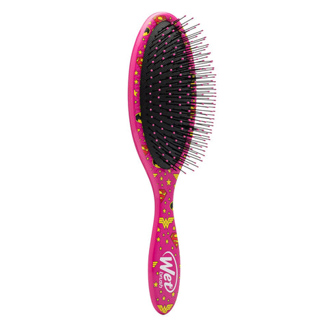 Wet Brush Justice League detangler brush with a pink design featuring superhero patterns