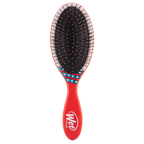 Wet Brush Justice League detangler brush with a red handle and star design for easy hair styling