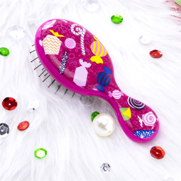 Wet Brush Mini Christmas Detangler in Pink with Colorful Candy Design for Effortless Hair Untangling