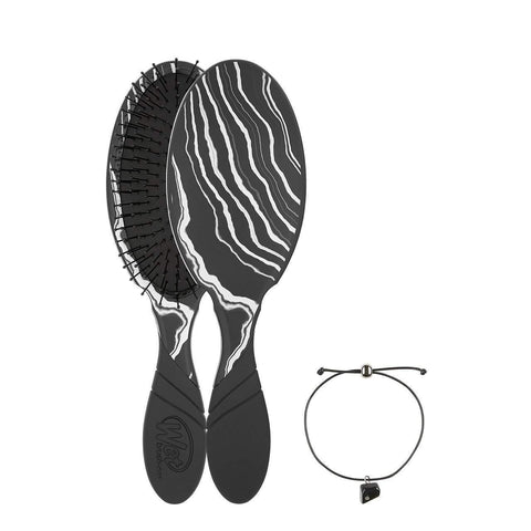 Wet Brush Mystical Crystal Detangler with black and white swirl design and matching adjustable bracelet