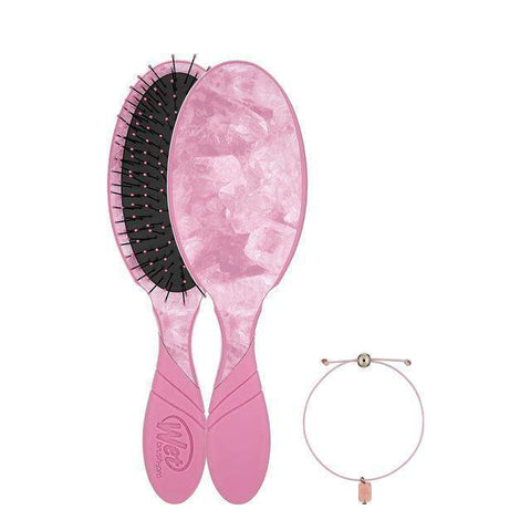 Wet Brush Mystical Crystal Detangler pink hairbrush with crystal pattern and matching bracelet