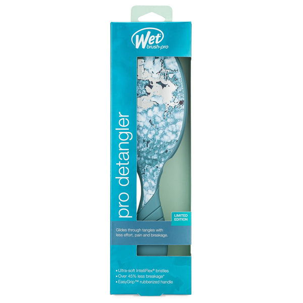 Wet Brush Pro Detangler hairbrush with blue marble design and ergonomic handle in retail packaging