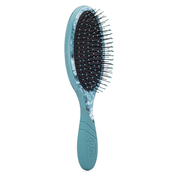 Wet Brush Pro Detangler with marbled teal handle and flexible bristles for gentle hair brushing