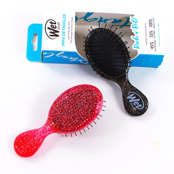 Wet Brush travel size detangler brush set in pink and black for easy hair detangling on the go