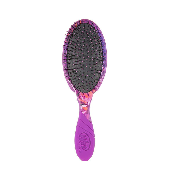Wet Brush with tropical design hair brush featuring a purple handle and black bristles with pink tips