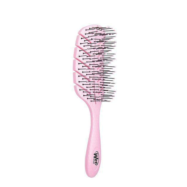 Wet Brush Eco-Friendly Hair Detangler in pink with flexible bristles for easy detangling