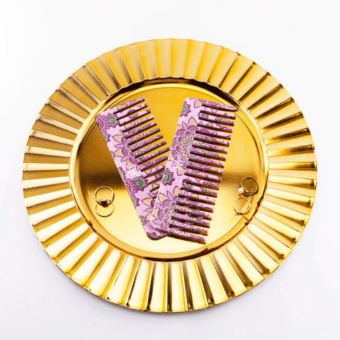 Wet Brush Moroccan print detangler comb in purple with intricate floral design on gold plate