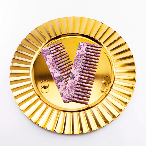 Wet Brush Moroccan print detangler comb in purple with intricate floral design on gold plate