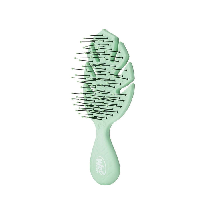 Wet Brush eco-friendly mini hairbrush in green with flexible bristles and ergonomic handle
